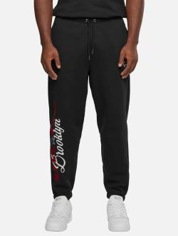 Karl Kani Small Signature Patched Relaxed Fit Cuffed Sweatpants von Karl Kani